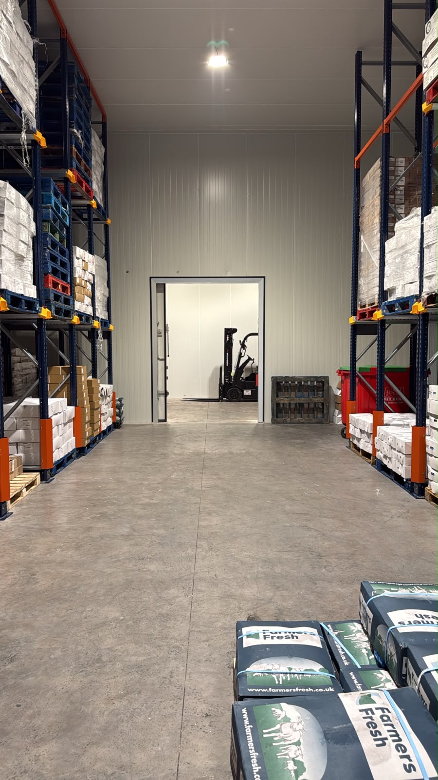 Forklift and pallet handling area in the DMS Meats warehouse